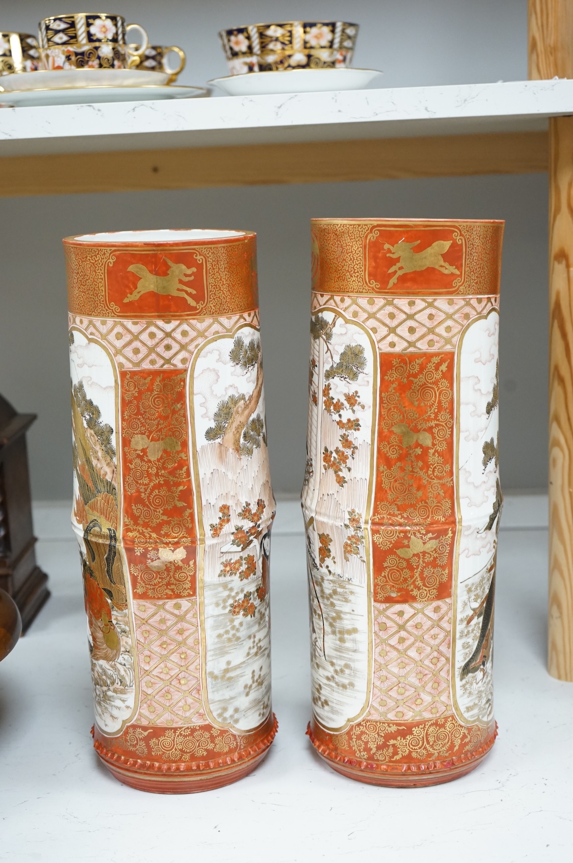 A pair of large Japanese Kutani bamboo shaped vases, Meiji period, 37.5cm high